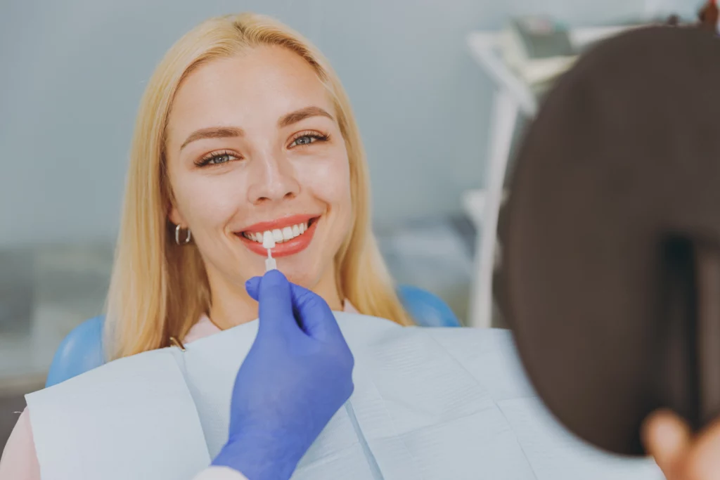 Woman getting porcelain veneers treatment | 24th Street Dental in Phoenix, AZ
