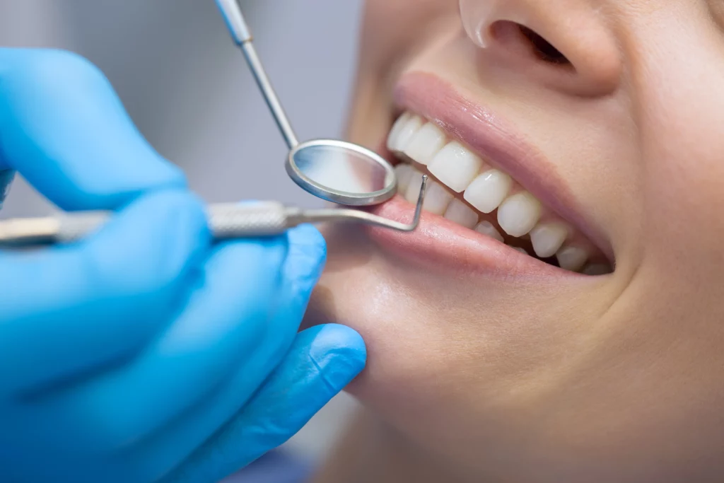 Surgeon checking patient teeth | 24th Street Dental in Phoenix, AZ
