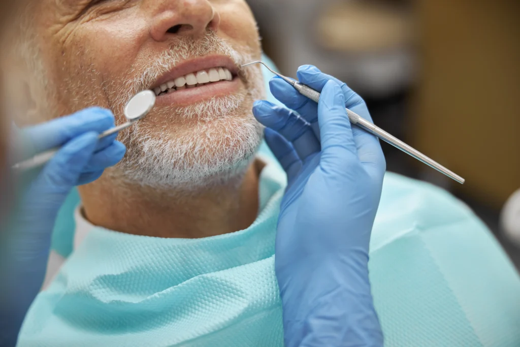 Senior Patient Receiving Porcelain Veneers In Phoenix, AZ | 24th Street Dental Biltmore